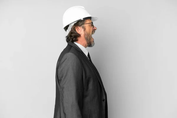 Young Architect Man Helmet Isolated Background Laughing Lateral Position — 스톡 사진