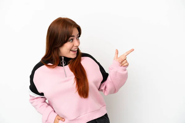 Young Redhead Woman Isolated White Background Pointing Finger Side Presenting — 图库照片