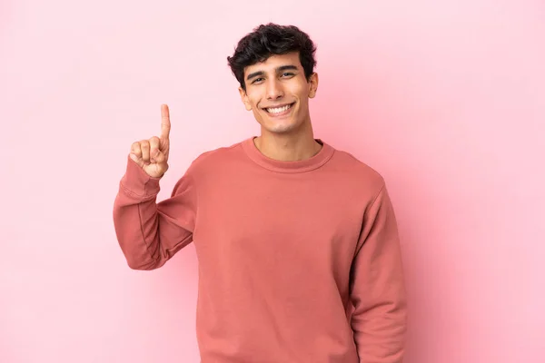 Young Argentinian Man Isolated Pink Background Showing Lifting Finger Sign — Stock fotografie