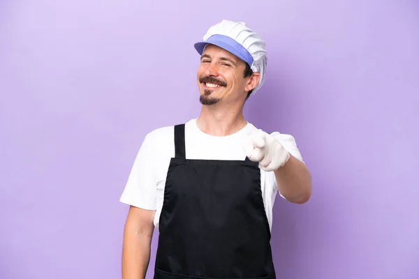 Fishmonger Man Wearing Apron Isolated Purple Background Pointing Front Happy — Zdjęcie stockowe