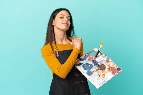 Young Artist Caucasian Woman Holding Palette Isolated Blue Background Proud —  Fotos de Stock