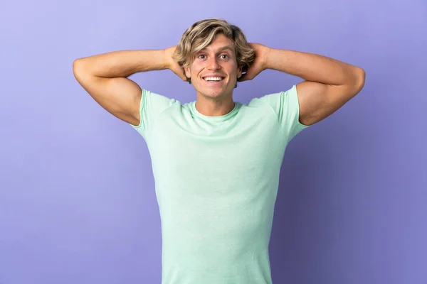 English man over isolated purple background laughing