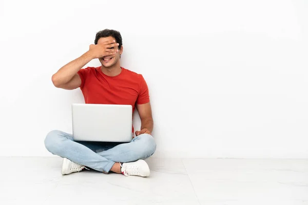 Caucasian Handsome Man Laptop Sitting Floor Covering Eyes Hands Smiling — Φωτογραφία Αρχείου