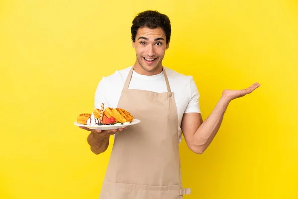 Restaurant Waiter Holding Waffles Isolated Yellow Background Shocked Facial Expression — Photo