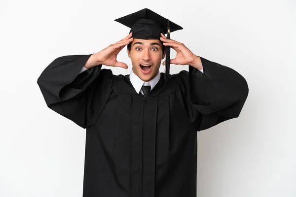 Jeune Diplômé Universitaire Sur Fond Blanc Isolé Avec Expression Surprise — Photo