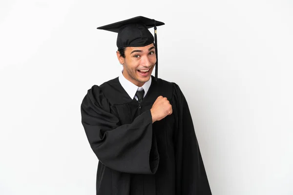 Genç Üniversite Mezunu Izole Edilmiş Beyaz Arka Planda Zaferi Kutluyor — Stok fotoğraf