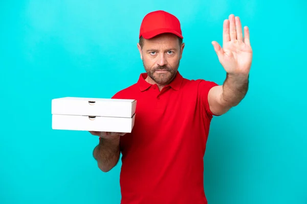 Pizza Delivery Man Work Uniform Picking Pizza Boxes Isolated Blue — Stock fotografie