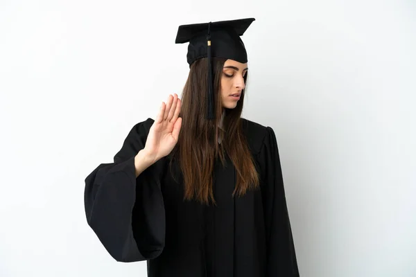 Joven Graduado Universitario Aislado Sobre Fondo Blanco Haciendo Stop Gesture —  Fotos de Stock