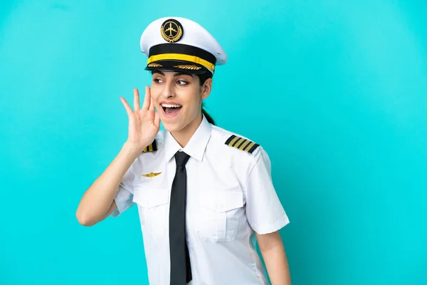 Airplane Pilot Caucasian Woman Isolated Blue Background Listening Something Putting — 图库照片