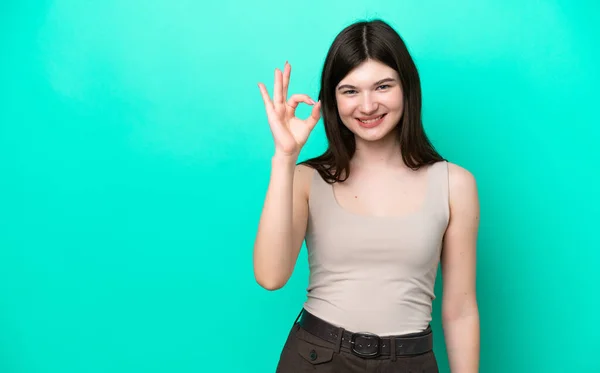 Young Russian Woman Isolated Green Background Showing Sign Fingers — Foto de Stock