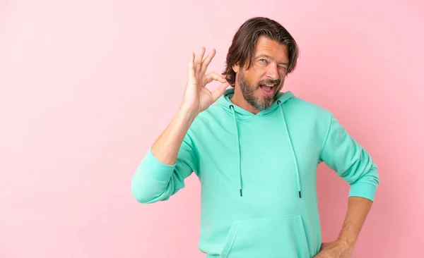 Senior Dutch Man Isolated Pink Background Showing Sign Fingers — Photo
