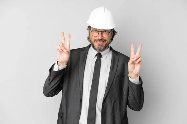 Young Architect Man Helmet Isolated Background Showing Victory Sign Both — Stockfoto
