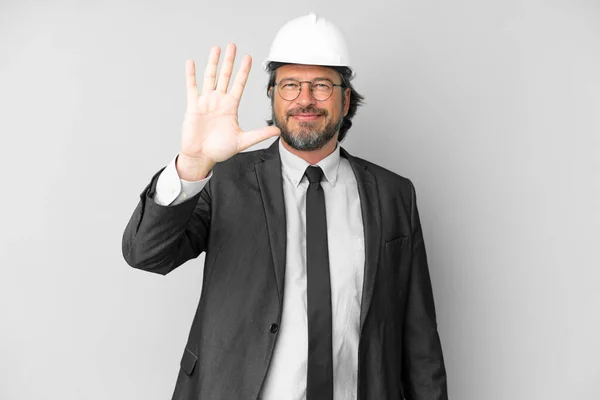 Young Architect Man Helmet Isolated Background Counting Five Fingers — ストック写真