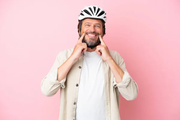 Senior Dutch Man Bike Helmet Isolated Pink Background Smiling Happy — стоковое фото