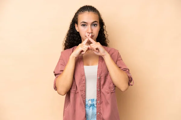 Young Woman Isolated Beige Background Showing Sign Silence Gesture —  Fotos de Stock