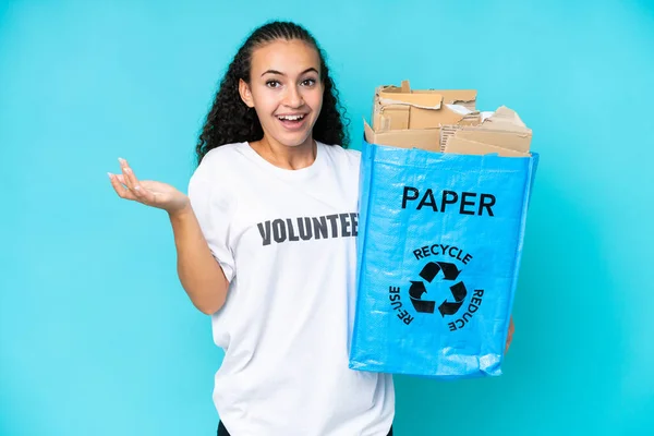 Young Woman Holding Recycling Bag Full Paper Recycle Isolated Blue — Stock Photo, Image