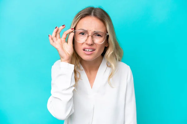 Young Russian Woman Isolated Blue Background Glasses Frustrated Expression — Stockfoto