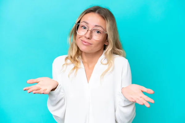 Young Russian Woman Isolated Blue Background Glasses Having Doubts — Stockfoto