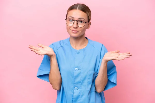 Young Nurse Doctor Woman Isolated Pink Background Having Doubts While — Stock Photo, Image