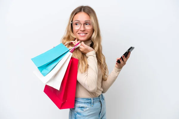Young Russian Woman Isolated White Background Holding Shopping Bags Mobile — 스톡 사진