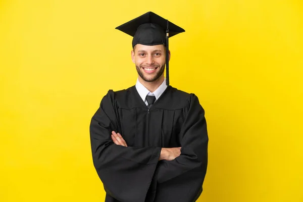 Young University Graduate Caucasian Man Isolated Yellow Background Keeping Arms — Stok fotoğraf