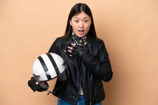 Young Chinese Woman Motorcycle Helmet Isolated Beige Background Surprised Shocked — 图库照片