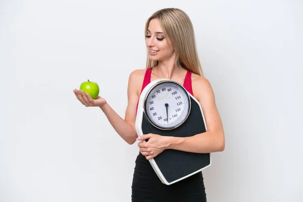 Pretty Blonde Woman Isolated White Background Holding Weighing Machine While — Stock Fotó