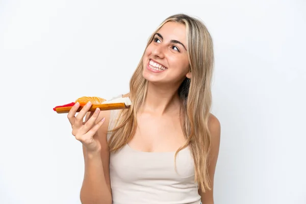 Young Caucasian Woman Holding Sashimi Isolated White Background Looking While — Foto de Stock