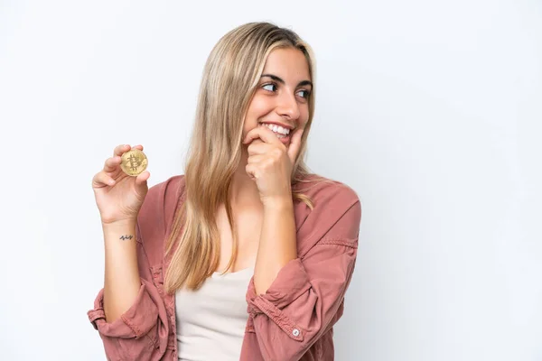 Young Caucasian Woman Holding Bitcoin Isolated White Background Thinking Idea — 图库照片