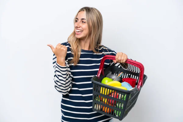 Young Caucasian Woman Holding Shopping Basket Full Food Isolated White — Φωτογραφία Αρχείου