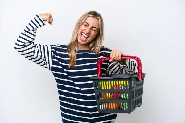 Young Caucasian Woman Holding Shopping Basket Full Food Isolated White — 스톡 사진