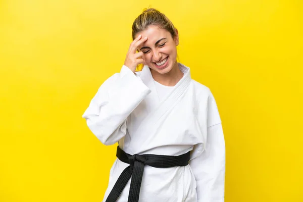 Young Caucasian Woman Doing Karate Isolated Yellow Background Laughing — Foto de Stock