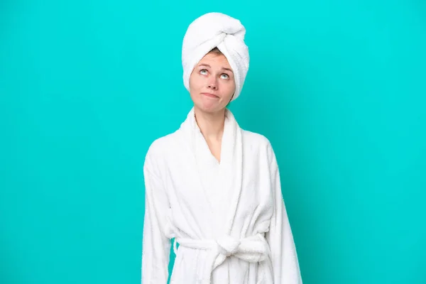 Young Woman Bathrobe Isolated Blue Background Looking — ストック写真