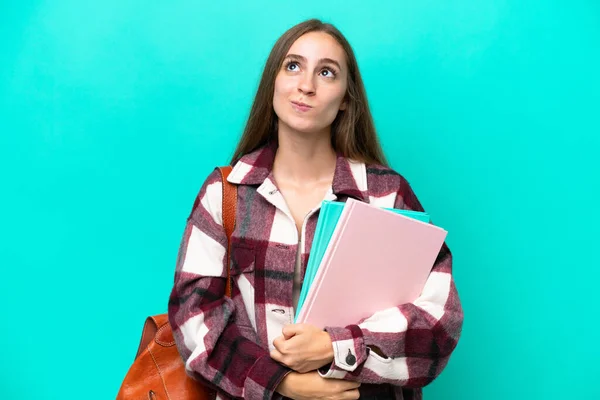 Young Student Caucasian Woman Isolated Blue Background Looking — 图库照片