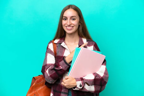 Young Student Caucasian Woman Isolated Blue Background Pointing Side Present — 스톡 사진