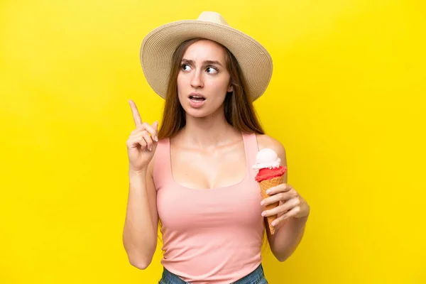 Young Caucasian Cornet Ice Cream Isolated Yellow Background Thinking Idea — Φωτογραφία Αρχείου