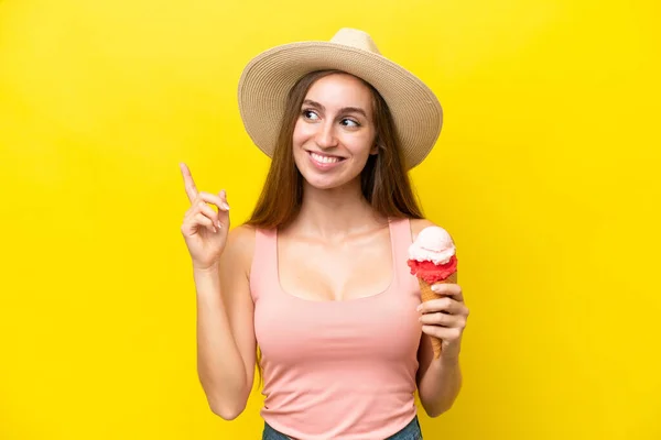 Young Caucasian Cornet Ice Cream Isolated Yellow Background Pointing Great — Φωτογραφία Αρχείου