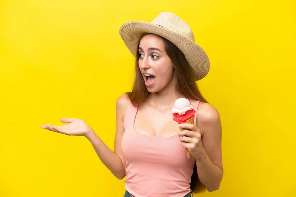 Young Caucasian Cornet Ice Cream Isolated Yellow Background Surprise Expression — Φωτογραφία Αρχείου