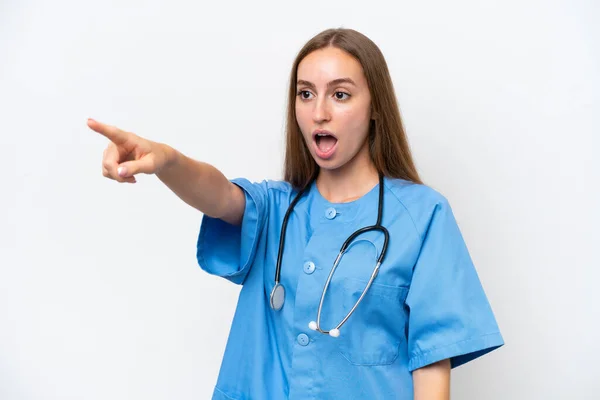 Young Nurse Woman Isolated White Background Pointing Away — Stockfoto