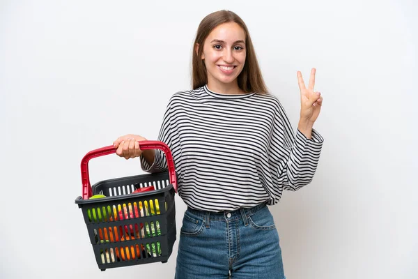 Young Rumanian Woman Holding Shopping Basket Full Food Isolated White — Φωτογραφία Αρχείου