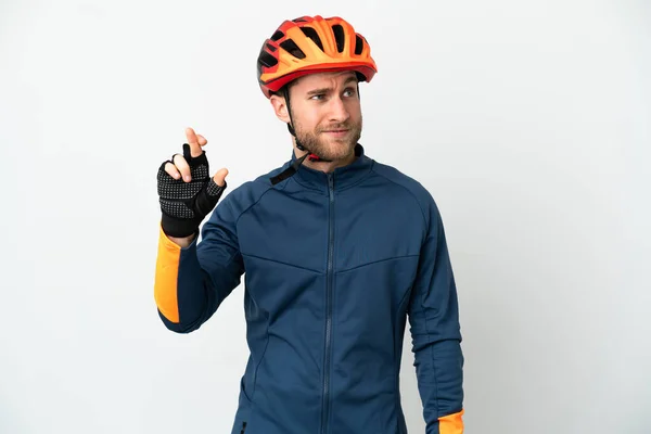 Young Cyclist Man Isolated White Background Fingers Crossing Wishing Best —  Fotos de Stock