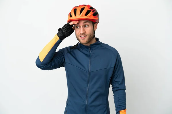 Young Cyclist Man Isolated White Background Doing Surprise Gesture While —  Fotos de Stock
