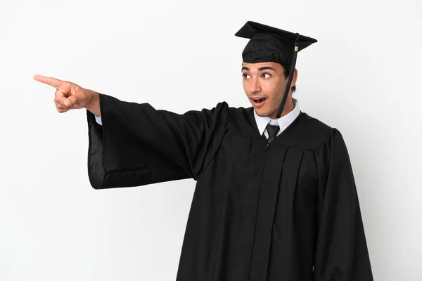 Young University Graduate Isolated White Background Pointing Away — Foto Stock