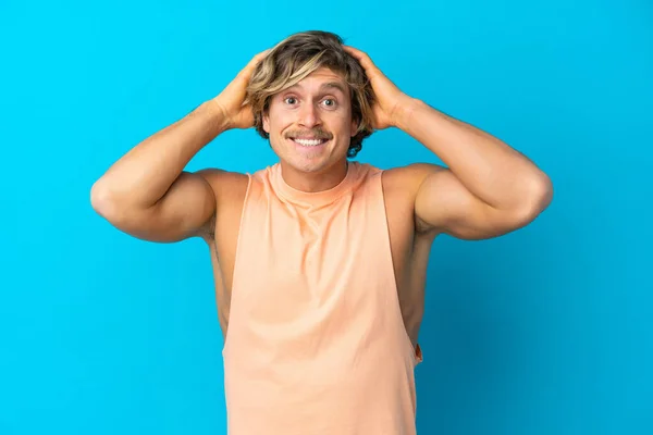 Handsome Blonde Man Isolated Blue Background Doing Nervous Gesture — Fotografia de Stock