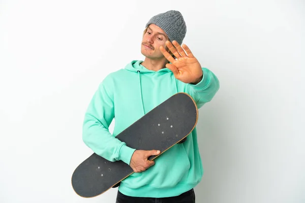 Young Skater Blonde Man Isolated White Background Making Stop Gesture — Foto de Stock