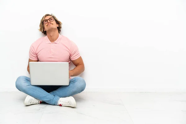 Young Caucasian Man Sitting Floor His Laptop Isolated White Background — Fotografia de Stock