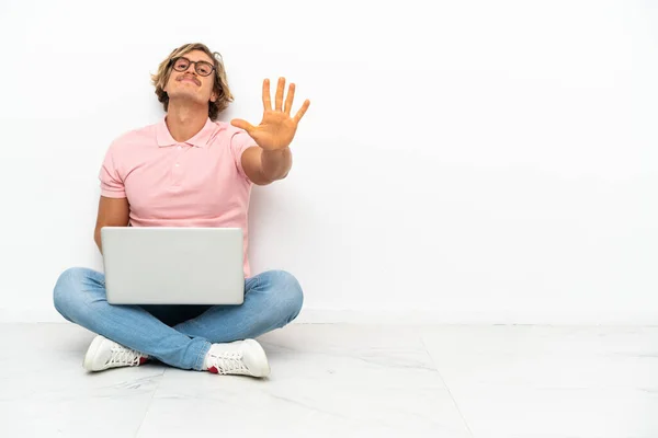 Young Caucasian Man Sitting Floor His Laptop Isolated White Background — Stockfoto