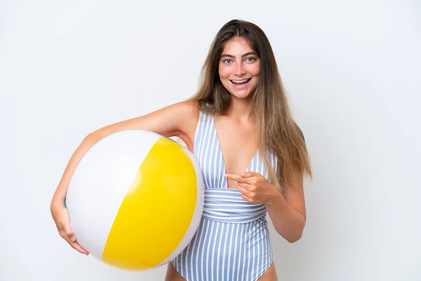 Young Woman Swimsuit Holding Beach Ball Isolated White Background Pointing — Stock Photo, Image