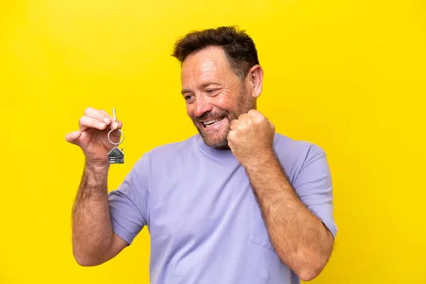 Middle Age Man Holding Home Keys Isolated Yellow Background Celebrating — Photo