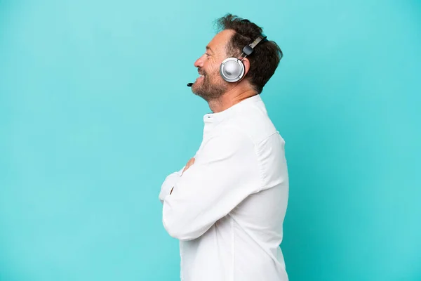 Telemarketer Caucasian Man Working Headset Isolated Blue Background Lateral Position — Fotografia de Stock